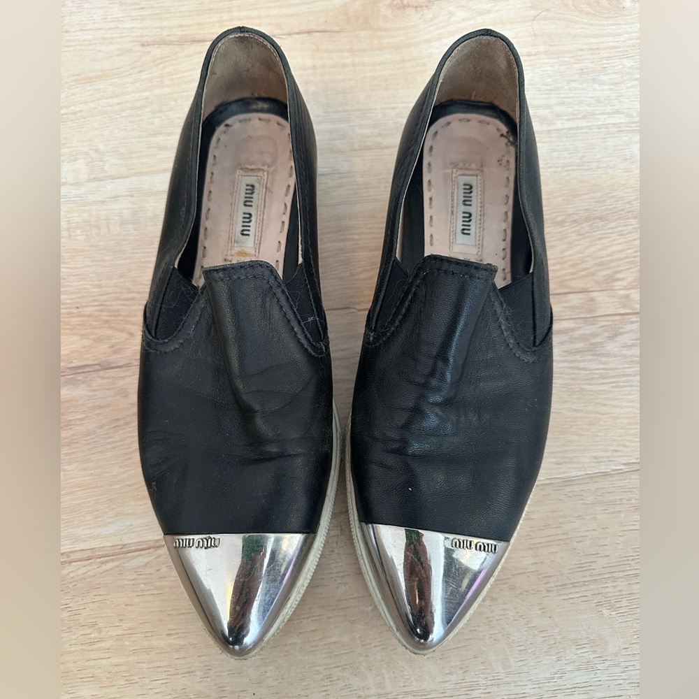 Miu Miu Black Leather Loafers with Silver Cap Toe